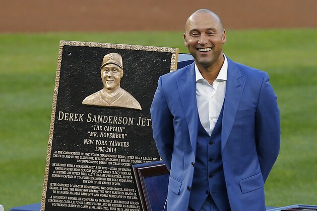 NEW YORK, NY - MAY 14: Former New York Yankees great, Derek Jeter stands in front of his plaque during a pregame ceremony honoring Jeter and retiring his number 2 at Yankee Stadium on May 14, 2017 in New York City. (Photo by Rich Schultz/Getty Images)