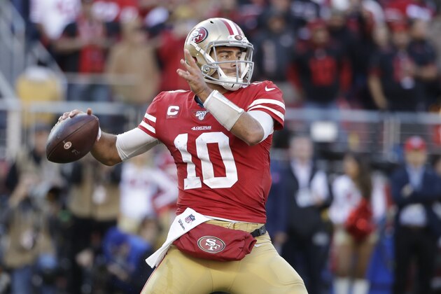 San Francisco 49ers quarterback Jimmy Garoppolo (10) passes against the Minnesota Vikings during the first half of an NFL divisional playoff football game, Saturday, Jan. 11, 2020, in Santa Clara, Calif. (AP Photo/Marcio Jose Sanchez)