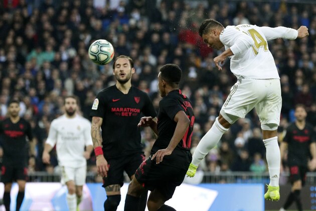 Real Madrid's Casemiro, right, scores his side's second goal during the Spanish La Liga soccer match between Real Madrid and Sevilla at Santiago Bernabeu stadium in Madrid, Saturday, Jan. 18, 2020. (AP Photo/Manu Fernandez) Real Madrid's Casemiro, right, scores his side's second goal during the Spanish La Liga soccer match between Real Madrid and Sevilla at Santiago Bernabeu stadium in Madrid, Saturday, Jan. 18, 2020. (AP Photo/Manu Fernandez)
