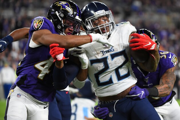 BALTIMORE, MARYLAND - JANUARY 11: Derrick Henry #22 of the Tennessee Titans carries the ball against the defense of the Baltimore Ravens during the AFC Divisional Playoff game at M&T Bank Stadium on January 11, 2020 in Baltimore, Maryland. (Photo by Will Newton/Getty Images) BALTIMORE, MARYLAND - JANUARY 11: Derrick Henry #22 of the Tennessee Titans carries the ball against the defense of the Baltimore Ravens during the AFC Divisional Playoff game at M&T Bank Stadium on January 11, 2020 in Baltimore, Maryland. (Photo by Will Newton/Getty Images)