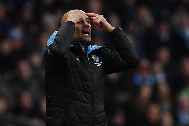 Manchester City's Spanish manager Pep Guardiola reacts during the English Premier League football match between Manchester City and Crystal Palace at the Etihad Stadium in Manchester, north west England, on January 18, 2020. (Photo by Paul ELLIS / AFP) / RESTRICTED TO EDITORIAL USE. No use with unauthorized audio, video, data, fixture lists, club/league logos or 'live' services. Online in-match use limited to 120 images. An additional 40 images may be used in extra time. No video emulation. Social media in-match use limited to 120 images. An additional 40 images may be used in extra time. No use in betting publications, games or single club/league/player publications. /  (Photo by PAUL ELLIS/AFP via Getty Images)