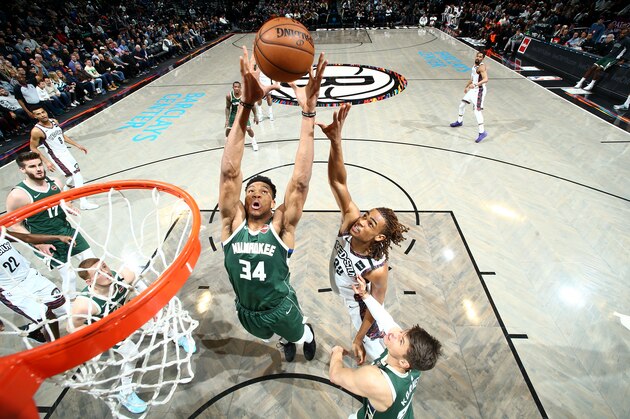BROOKLYN, NY - JANUARY 18: Giannis Antetokounmpo #34 of the Milwaukee Bucks grabs the rebound against the Brooklyn Nets on January 18, 2020 at Barclays Center in Brooklyn, New York. NOTE TO USER: User expressly acknowledges and agrees that, by downloading and or using this Photograph, user is consenting to the terms and conditions of the Getty Images License Agreement. Mandatory Copyright Notice: Copyright 2020 NBAE (Photo by Nathaniel S. Butler/NBAE via Getty Images)