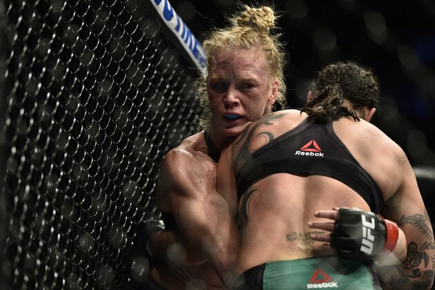 LAS VEGAS, NEVADA - JANUARY 18: Holly Holm wrestles Raquel Pennington in their bantamweight fight during the UFC 246 event at T-Mobile Arena on January 18, 2020 in Las Vegas, Nevada. (Photo by Chris Unger/Zuffa LLC via Getty Images)