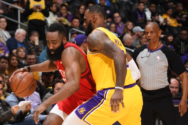 LOS ANGELES, CA - FEBRUARY 21: James Harden #13 of the Houston Rockets handles the ball against LeBron James #23 of the Los Angeles Lakers on February 21, 2019 at STAPLES Center in Los Angeles, California. NOTE TO USER: User expressly acknowledges and agrees that, by downloading and/or using this Photograph, user is consenting to the terms and conditions of the Getty Images License Agreement. Mandatory Copyright Notice: Copyright 2019 NBAE (Photo by Andrew D. Bernstein/NBAE via Getty Images)