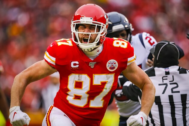 KANSAS CITY, MO - JANUARY 12: Travis Kelce #87 of the Kansas City Chiefs celebrates his pass catch and run during the second quarter of the AFC Divisional playoff game against the Houston Texans at Arrowhead Stadium on January 12, 2020 in Kansas City, Missouri. (Photo by David Eulitt/Getty Images)