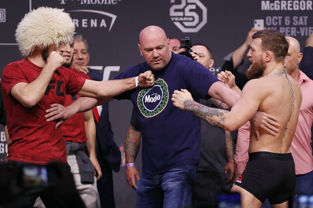 Dana White, center, keeps Khabib Nurmagomedov, left, and Conor McGregor away from each other during a ceremonial weigh-in for the UFC 229 mixed martial arts fight Friday, Oct. 5, 2018, in Las Vegas. (AP Photo/John Locher) Dana White, center, keeps Khabib Nurmagomedov, left, and Conor McGregor away from each other during a ceremonial weigh-in for the UFC 229 mixed martial arts fight Friday, Oct. 5, 2018, in Las Vegas. (AP Photo/John Locher)