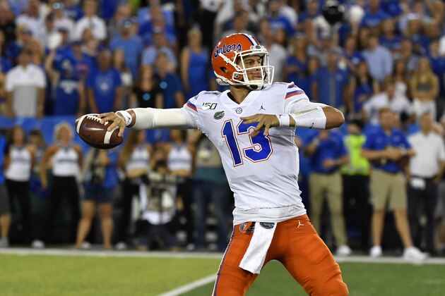 Florida quarterback Feleipe Franks (13) in action during the first half of an NCAA college football game in Lexington, Ky., Saturday, Sept. 14, 2019. (AP Photo/Timothy D. Easley)