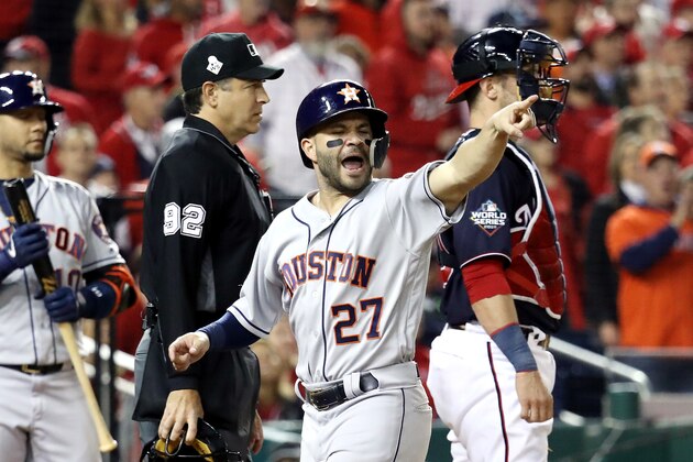 WASHINGTON, DC - OCTOBER 26:  Jose Altuve #27 of the Houston Astros rounds celebrates after he scores a run on a hit by Alex Bregman (not pictured) against the Washington Nationals during the first inning in Game Four of the 2019 World Series at Nationals Park on October 26, 2019 in Washington, DC. (Photo by Rob Carr/Getty Images)