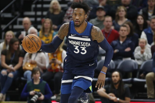 Minnesota Timberwolves forward Robert Covington (33) brings the ball up court in the first half during an NBA basketball game against the Utah Jazz Monday, Nov. 18, 2019, in Salt Lake City. (AP Photo/Rick Bowmer)