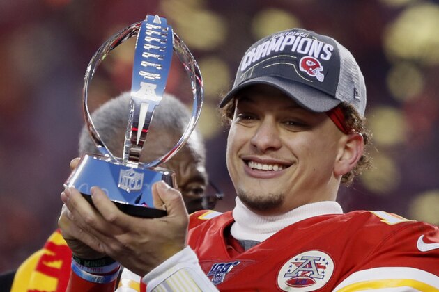 Kansas City Chiefs' Patrick Mahomes holds up the Lamar Hunt Trophy after the NFL AFC Championship football game against the Tennessee Titans Sunday, Jan. 19, 2020, in Kansas City, MO. The Chiefs won 35-24 to advance to Super Bowl 54. (AP Photo/Charlie Neibergall)