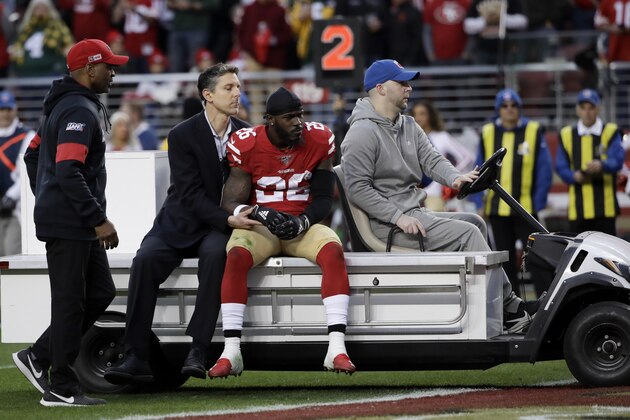 San Francisco 49ers running back Tevin Coleman is taken off the field during the first half of the NFL NFC Championship football game against the Green Bay Packers Sunday, Jan. 19, 2020, in Santa Clara, Calif. (AP Photo/Marcio Jose Sanchez) San Francisco 49ers running back Tevin Coleman is taken off the field during the first half of the NFL NFC Championship football game against the Green Bay Packers Sunday, Jan. 19, 2020, in Santa Clara, Calif. (AP Photo/Marcio Jose Sanchez)