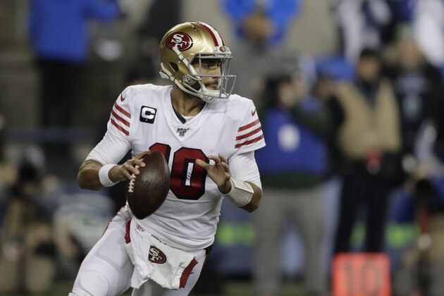 San Francisco 49ers quarterback Jimmy Garoppolo in action against the Seattle Seahawks during the first half of an NFL football game, Sunday, Dec. 29, 2019, in Seattle. (AP Photo/Stephen Brashear)