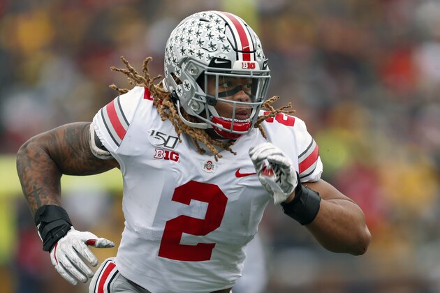 FILE - In this Nov. 30, 2019, file photo, Ohio State defensive end Chase Young plays against Michigan in the first half of an NCAA college football game, in Ann Arbor, Mich. Record-setting defensive end Chase Young is leaving Ohio State early to enter the NFL draft, a widely expected move. The junior Heisman Trophy finalist made the announcement Friday, Jan. 3, 2020, on Twitter. He says he looks forward to