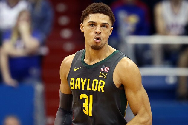 LAWRENCE, KANSAS - JANUARY 11:  MaCio Teague #31 of the Baylor Bears reacts after making a three-pointer during the game against the Kansas Jayhawks at Allen Fieldhouse on January 11, 2020 in Lawrence, Kansas. (Photo by Jamie Squire/Getty Images)