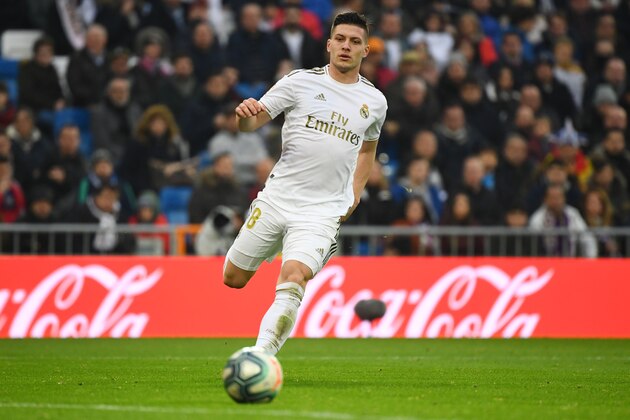 Real Madrid's Serbian forward Luka Jovic runs for the ball during the Spanish league football match between Real Madrid CF and Sevilla FC at the Santiago Bernabeu stadium in Madrid on January 18, 2020. (Photo by GABRIEL BOUYS / AFP) (Photo by GABRIEL BOUYS/AFP via Getty Images) Real Madrid's Serbian forward Luka Jovic runs for the ball during the Spanish league football match between Real Madrid CF and Sevilla FC at the Santiago Bernabeu stadium in Madrid on January 18, 2020. (Photo by GABRIEL BOUYS / AFP) (Photo by GABRIEL BOUYS/AFP via Getty Images)