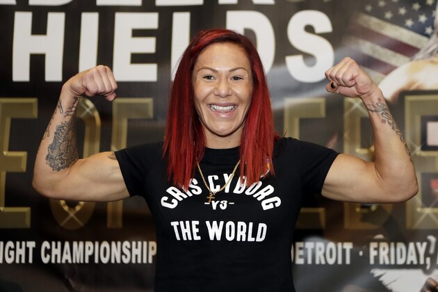 Brazilian-American mixed martial arts superstar, current UFC Women's Featherweight Champion, and Claressa Shields sparring partner, Cris Cyborg, poses before Shields weighs in, Thursday, Aug. 3, 2017, in Detroit. (AP Photo/Carlos Osorio)