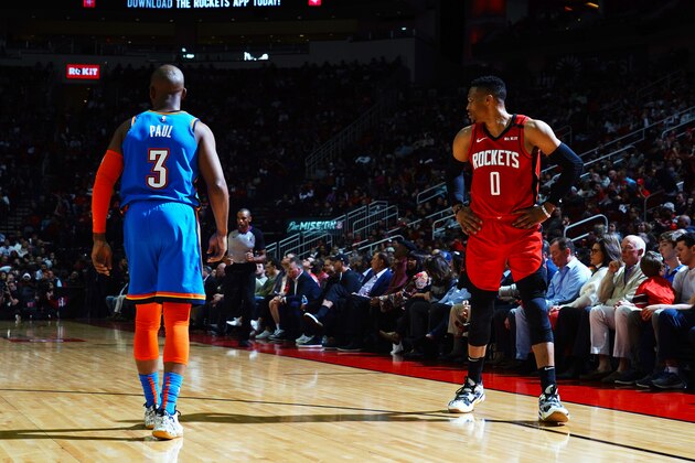 HOUSTON, TX - JANUARY 20:  Chris Paul #3 of the Oklahoma City Thunder guards Russell Westbrook #0 of the Houston Rockets during the game on January 20, 2020 at the Toyota Center in Houston, Texas. NOTE TO USER: User expressly acknowledges and agrees that, by downloading and or using this photograph, User is consenting to the terms and conditions of the Getty Images License Agreement. Mandatory Copyright Notice: Copyright 2020 NBAE (Photo by Cato Cataldo/NBAE via Getty Images)