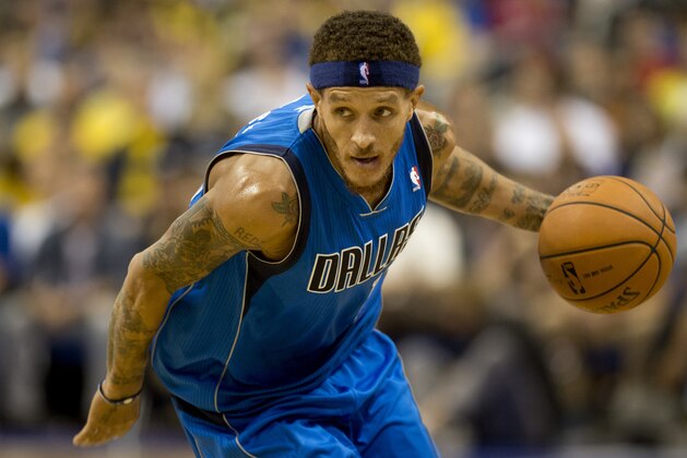 Dallas Mavericks' Delonte West runs during a basketball match Alba Berlin vs Dallas Mavericks at the O2 Arena in Berlin on October 6, 2012. The game is a part of the NBA Europe Live tour.  AFP PHOTO / ODD ANDERSEN        (Photo credit should read ODD ANDERSEN/AFP/GettyImages)