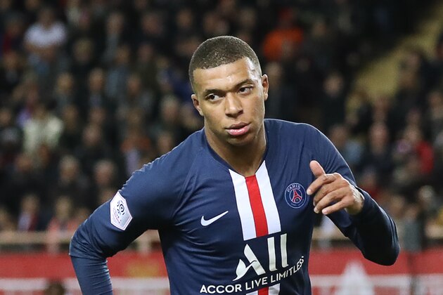 Paris Saint-Germain's French forward Kylian Mbappe celebrates after scoring a goal  during the French L1 football match between Monaco (ASM) and Paris Saint-Germain (PSG) at the Louis II Stadium in Monaco on January 15, 2020. (Photo by Valery HACHE / AFP) (Photo by VALERY HACHE/AFP via Getty Images)