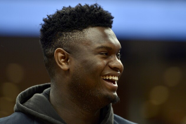 New Orleans Pelicans forward Zion Williamson laughs on the sideline in the first half of an NBA basketball game against the Memphis Grizzlies Monday, Jan. 20, 2020, in Memphis, Tenn. (AP Photo/Brandon Dill)