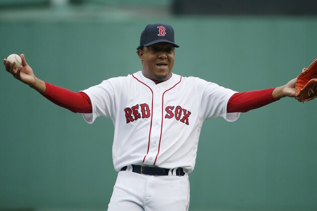 Former Boston Red Sox's Pedro Martinez warms up before a Red Sox alumni baseball game, Sunday, May 27, 2018, in Boston. (AP Photo/Michael Dwyer)