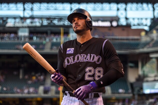 DENVER, CO - AUGUST 22:  Nolan Arenado #28 of the Colorado Rockies prepares to bat against the San Diego Padres in the first inning of a game at Coors Field on August 22, 2018 in Denver, Colorado.  (Photo by Dustin Bradford/Getty Images)