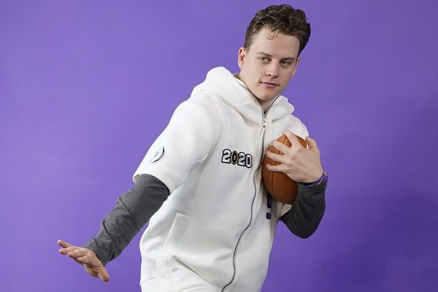 LSU quarterback Joe Burrow poses during media day for NCAA College Football Playoff national championship game Saturday, Jan. 11, 2020, in New Orleans. Clemson is scheduled to play LSU on Monday. (AP Photo/David J. Phillip).