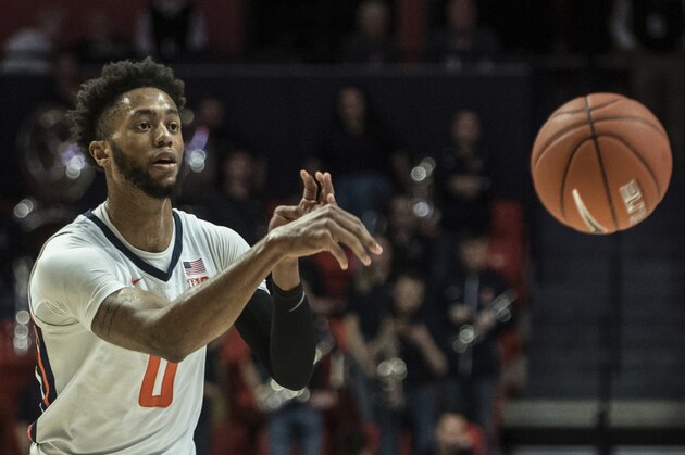 Illinois' Alan Griffin (0) pass the ball vs Rutgers in the first half of an NCAA college basketball game, Sunday, Jan. 11, 2020, in Champaign, Ill. (AP Photo/Holly Hart)