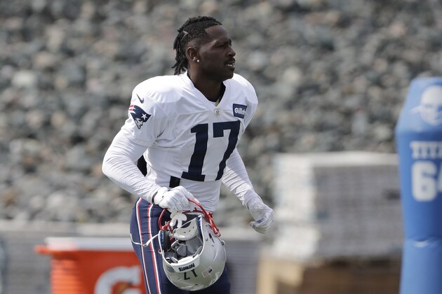 New England Patriots wide receiver Antonio Brown carries his helmet during an NFL football practice, Wednesday, Sept. 18, 2019, in Foxborough, Mass. (AP Photo/Steven Senne)