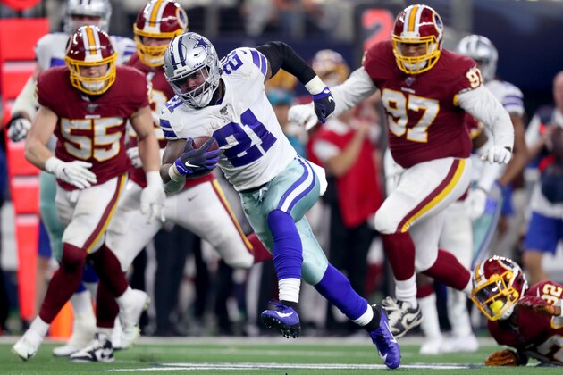 ARLINGTON, TEXAS - DECEMBER 29: Ezekiel Elliott #21 of the Dallas Cowboys carries the ball against the Washington Redskins in the second quarter at AT&T Stadium on December 29, 2019 in Arlington, Texas. (Photo by Tom Pennington/Getty Images)