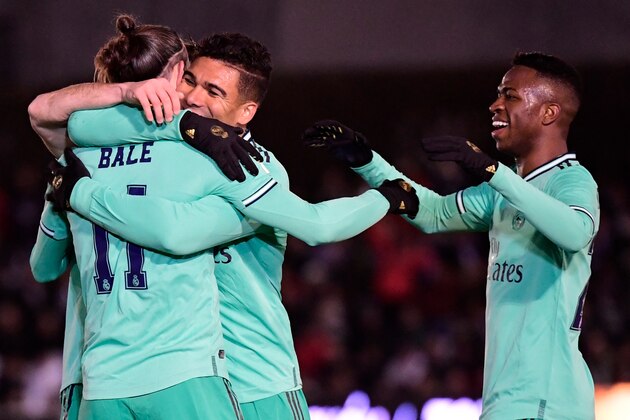 Real Madrid's Welsh forward Gareth Bale celebrates after scoring the opening goal during the Copa del Rey (King's Cup) football match between Unionistas de Salamanca CF and Real Madrid CF at Las Pistas del Helmantico stadium in Salamanca, on January 22, 2020. (Photo by JAVIER SORIANO / AFP) / The erroneous mention[s] appearing in the metadata of this photo by JAVIER SORIANO has been modified in AFP systems in the following manner: [Salamanca] instead of [Ibiza town]. Please immediately remove the erroneous mention[s] from all your online services and delete it (them) from your servers. If you have been authorized by AFP to distribute it (them) to third parties, please ensure that the same actions are carried out by them. Failure to promptly comply with these instructions will entail liability on your part for any continued or post notification usage. Therefore we thank you very much for all your attention and prompt action. We are sorry for the inconvenience this notification may cause and remain at your disp