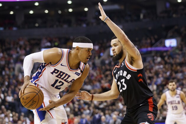 TORONTO, ON - JANUARY 22:  Fred VanVleet #23 of the Toronto Raptors defends Tobias Harris #12 of the Philadelphia 76ers during their NBA game at Scotiabank Arena on January 22, 2020 in Toronto, Canada. NOTE TO USER: User expressly acknowledges and agrees that, by downloading and or using this photograph, User is consenting to the terms and conditions of the Getty Images License Agreement. (Photo by Cole Burston/Getty Images)