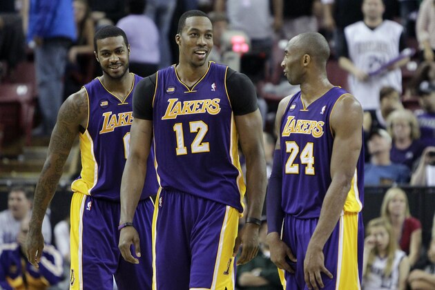 Los Angeles Lakers' Earl Clark, left, Dwight Howard, center, and Kobe Bryant smile during the closing moments of the Lakers 103-98 win over the Sacramento Kings in an NBA basketball game in Sacramento, Calif., Saturday, March 30, 2013. (AP Photo/Rich Pedroncelli) Los Angeles Lakers' Earl Clark, left, Dwight Howard, center, and Kobe Bryant smile during the closing moments of the Lakers 103-98 win over the Sacramento Kings in an NBA basketball game in Sacramento, Calif., Saturday, March 30, 2013. (AP Photo/Rich Pedroncelli)
