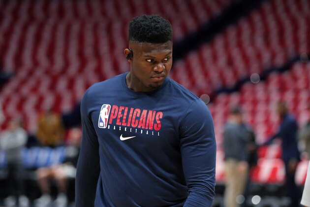New Orleans Pelicans forward Zion Williamson warms up before an NBA basketball game San Antonio Spurs in New Orleans, Wednesday, Jan. 22, 2020. It is the first overall draft pick's regular season NBA debut after being injured since preseason. (AP Photo/Gerald Herbert)