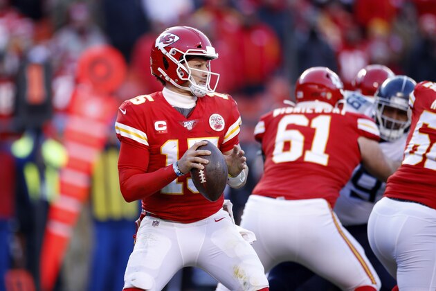 KANSAS CITY, MO - JANUARY 19: Patrick Mahomes #15 of the Kansas City Chiefs looks to pass the ball during the AFC Championship game against the Tennessee Titans at Arrowhead Stadium on January 19, 2020 in Kansas City, Missouri. The Chiefs defeated the Titans 35-24. (Photo by Joe Robbins/Getty Images)