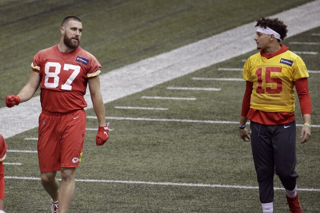 Kansas City Chiefs quarterback Patrick Mahomes (15) and tight end Travis Kelce (87) work out at NFL football practice Wednesday, Jan. 22, 2020 in Kansas City, Mo. The Chiefs will face the San Francisco 49ers in Super Bowl 54. (AP Photo/Charlie Riedel)
