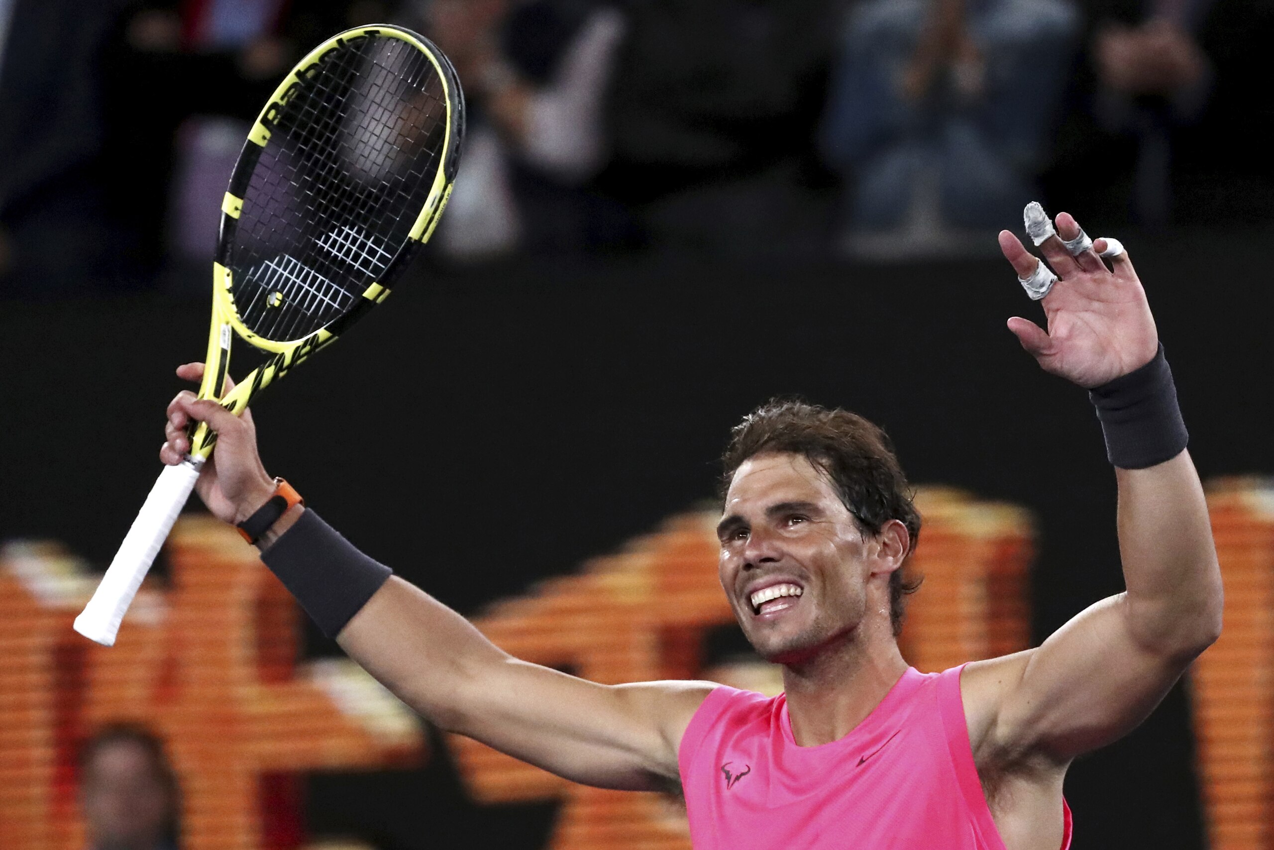 Spain's Rafael Nadal celebrates after defeating Federico Delbonis of Argentina in second round singles match at the Australian Open tennis championship in Melbourne, Australia, Thursday, Jan. 23, 2020. (AP Photo/Dita Alangkara)