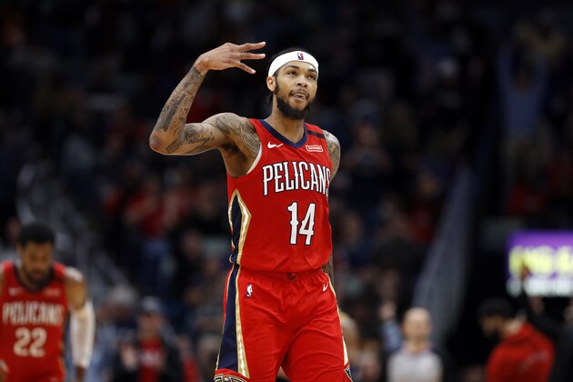 New Orleans Pelicans forward Brandon Ingram (14) celebrates after scoring a three-point basket against the Utah Jazz in the second half of an NBA basketball game in New Orleans, Monday, Jan. 6, 2020. The Jazz won 128-126. (AP Photo/Tyler Kaufman)