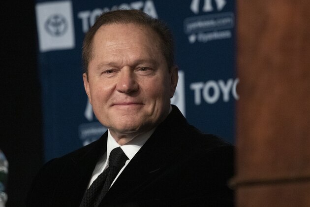 Agent Scott Boras listens as Gerrit Cole is introduced as the newest New York Yankees player during a baseball media availability, Wednesday, Dec. 18, 2019 in New York. The pitcher agreed to a 9-year $324 million contract. (AP Photo/Mark Lennihan)