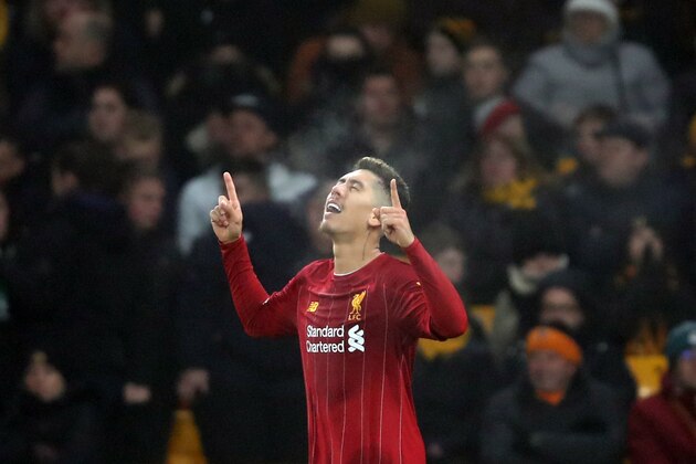 WOLVERHAMPTON, ENGLAND - JANUARY 23: Roberto Firmino of Liverpool celebrates scoring their 2nd goal during the Premier League match between Wolverhampton Wanderers and Liverpool FC at Molineux on January 23, 2020 in Wolverhampton, United Kingdom. (Photo by Marc Atkins/Getty Images)