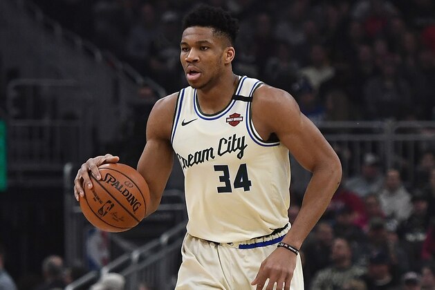MILWAUKEE, WISCONSIN - JANUARY 20:  Giannis Antetokounmpo #34 of the Milwaukee Bucks handles the ball during a game against the Chicago Bulls at Fiserv Forum on January 20, 2020 in Milwaukee, Wisconsin. NOTE TO USER: User expressly acknowledges and agrees that, by downloading and or using this photograph, User is consenting to the terms and conditions of the Getty Images License Agreement. (Photo by Stacy Revere/Getty Images)