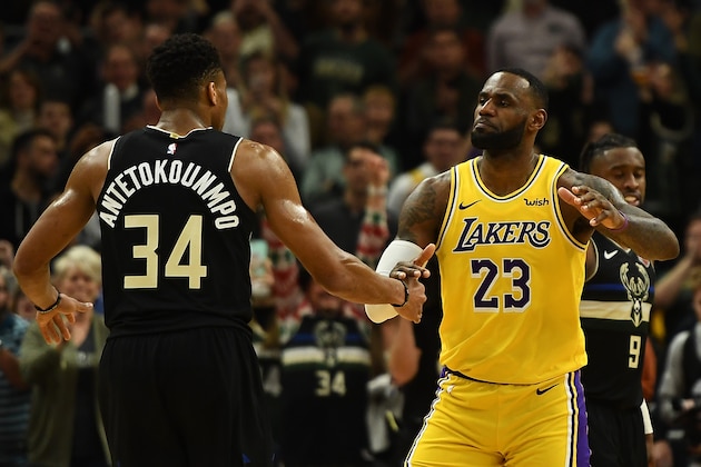 MILWAUKEE, WISCONSIN - DECEMBER 19: Giannis Antetokounmpo #34 of the Milwaukee Bucks and LeBron James #23 of the Los Angeles Lakers hug following a game at Fiserv Forum on December 19, 2019 in Milwaukee, Wisconsin. NOTE TO USER: User expressly acknowledges and agrees that, by downloading and or using this photograph, User is consenting to the terms and conditions of the Getty Images License Agreement. (Photo by Stacy Revere/Getty Images) MILWAUKEE, WISCONSIN - DECEMBER 19: Giannis Antetokounmpo #34 of the Milwaukee Bucks and LeBron James #23 of the Los Angeles Lakers hug following a game at Fiserv Forum on December 19, 2019 in Milwaukee, Wisconsin. NOTE TO USER: User expressly acknowledges and agrees that, by downloading and or using this photograph, User is consenting to the terms and conditions of the Getty Images License Agreement. (Photo by Stacy Revere/Getty Images)