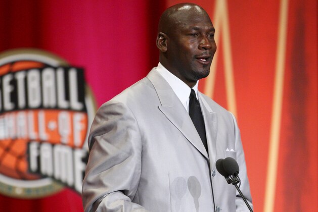 FILE - Former Chicago Bulls and Washington Wizards guard Michael Jordan smiles as he delivers his address during his enshrinement ceremony into the Naismith Basketball Hall of Fame in Springfield, Mass., in this Sept. 11, 2009 file photo. Jordan has struck a deal to buy controlling interest of the Charlotte Bobcats, taking charge of the money-losing team in his home state.Traci Blunt, a spokeswoman for owner Bob Johnson, told The Associated Press that Jordan was able to put together an ownership group late Friday Feb. 26, 2010 to buy the team he has been a part-owner of since 2006.  (AP Photo/Stephan Savoia, File)