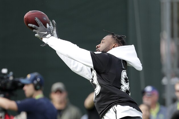 AFC wide receiver Jarvis Landry, of the Cleveland Browns, catches a pass during a practice for the NFL Pro Bowl football game Thursday, Jan. 23, 2020, in Kissimmee, Fla. (AP Photo/John Raoux)