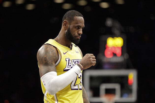 Los Angeles Lakers' LeBron James walks on the court during the second half of an NBA basketball game against the Brooklyn Nets Thursday, Jan. 23, 2020, in New York. The Lakers won 128-113. (AP Photo/Frank Franklin II) Los Angeles Lakers' LeBron James walks on the court during the second half of an NBA basketball game against the Brooklyn Nets Thursday, Jan. 23, 2020, in New York. The Lakers won 128-113. (AP Photo/Frank Franklin II)