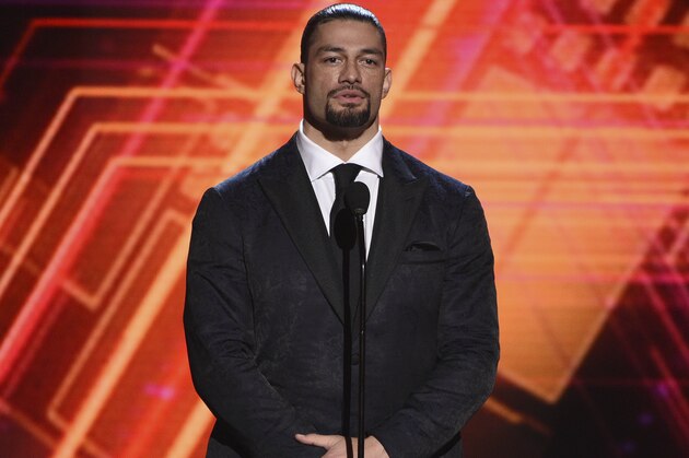 Roman Reigns presents the best coach award at the ESPY Awards on Wednesday, July 10, 2019, at the Microsoft Theater in Los Angeles. (Photo by Chris Pizzello/Invision/AP)