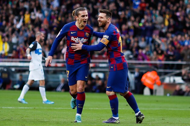 BARCELONA, SPAIN - DECEMBER 21: Antoine Griezmann of FC Barcelona celebrates after scoring the 1-0 with teammate Lionel Messi during the Liga match between FC Barcelona and Deportivo Alaves at Camp Nou on December 21, 2019 in Barcelona, Spain. (Photo by Eric Alonso/MB Media/Getty Images) BARCELONA, SPAIN - DECEMBER 21: Antoine Griezmann of FC Barcelona celebrates after scoring the 1-0 with teammate Lionel Messi during the Liga match between FC Barcelona and Deportivo Alaves at Camp Nou on December 21, 2019 in Barcelona, Spain. (Photo by Eric Alonso/MB Media/Getty Images)