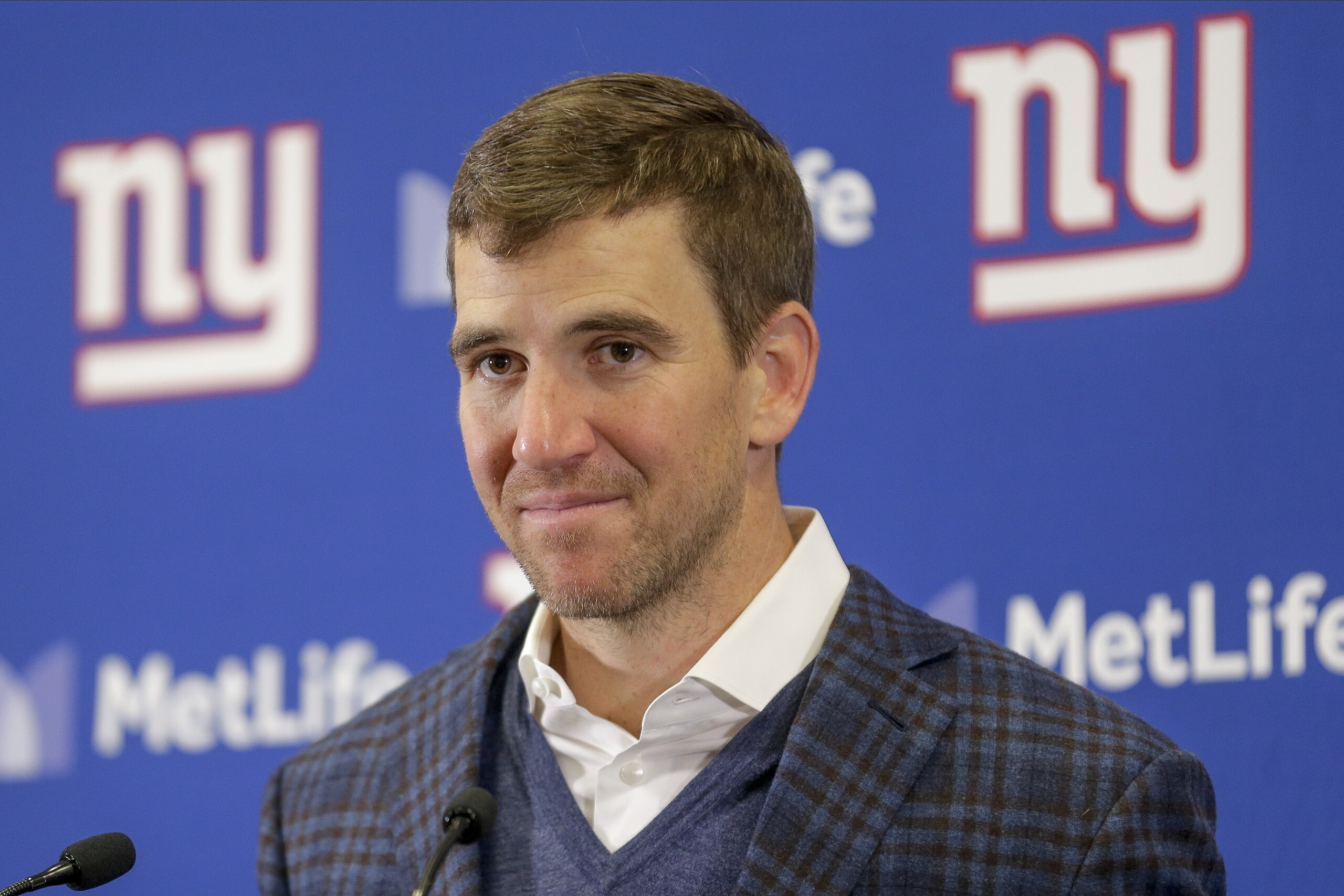New York Giants quarterback Eli Manning answers questions during a news conference after playing against the Miami Dolphins in an NFL football game, Sunday, Dec. 15, 2019, in East Rutherford, N.J. (AP Photo/Seth Wenig)