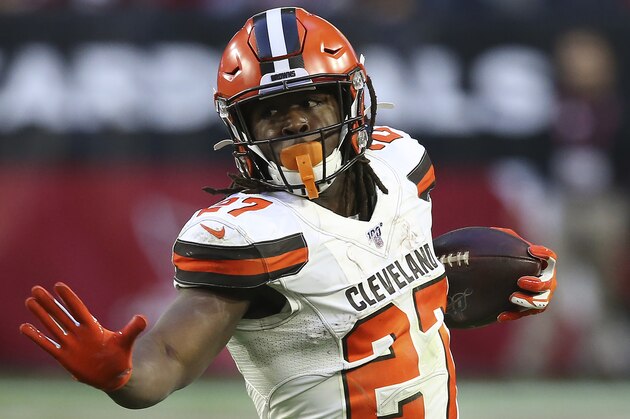 Cleveland Browns running back Kareem Hunt (27) runs against the Arizona Cardinals during the second half of an NFL football game, Sunday, Dec. 15, 2019, in Glendale, Ariz. (AP Photo/Ross D. Franklin)