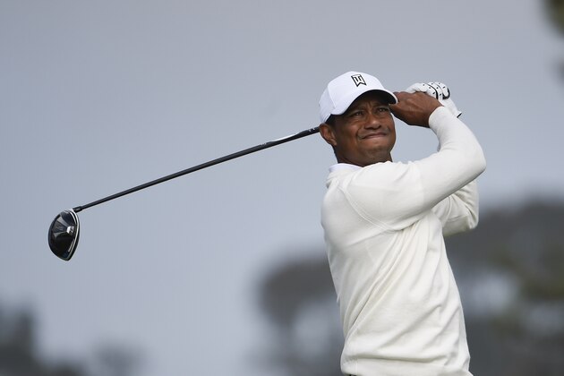 Tiger Woods hits his tee shot on the fifth hole of the South Course at Torrey Pines Golf Course during the second round of the Farmers Insurance golf tournament Friday Jan. 24, 2020, in San Diego. (AP Photo/Denis Poroy)